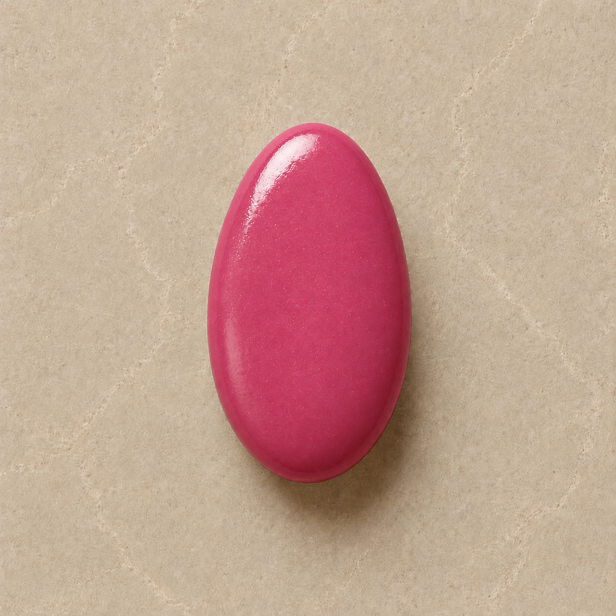 Fuchsia Pink Chocolate Dragées, dark-chocolate-centred dragée coated by hand